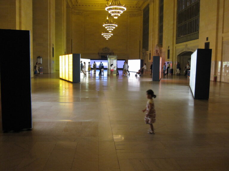 girl running through the Mandela Day Installation at Grand Central