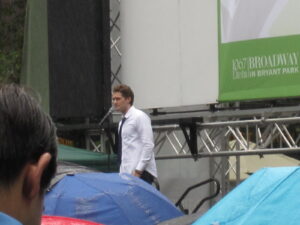 Matthew Morrison on stage at Broadway in Bryant Park