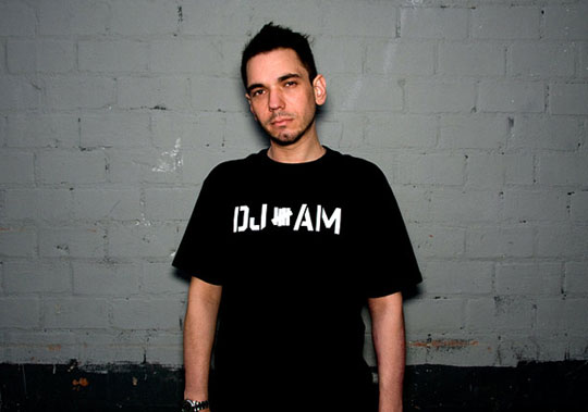 Adam Goldstein (a.k.a. DJ AM) in his logo t-shirt