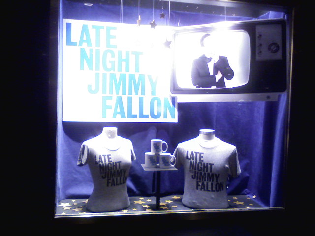 Display of Late Night with Jimmy Fallon mugs and t-shirts