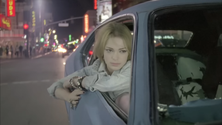 Uffie in a vintage car in the ADD SUV video